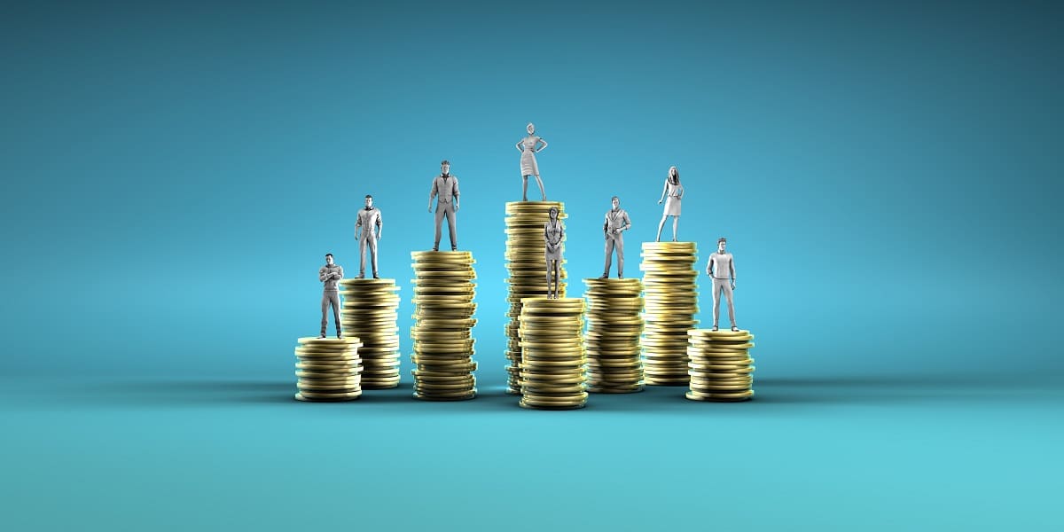Figurines posed on stacks of coins